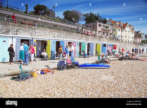 Colourful Beach Huts On The Sea Front At Lyme Regis Dorset England