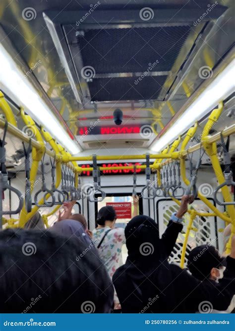 Inside of a Busy Bus Ride Filled with Tired Worker Went Home