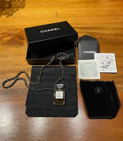 Chanel no5 Perfume Bottle Necklace, Women's Fashion, Jewelry & Organizers, Necklaces on Carousell