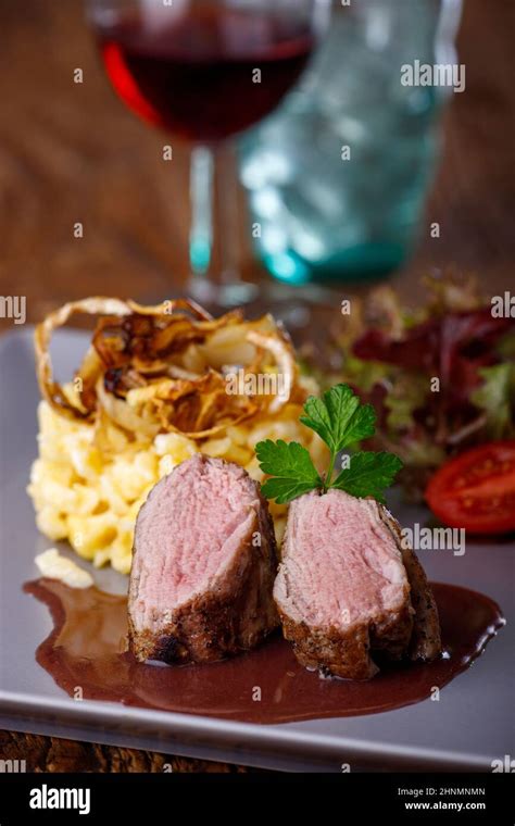 Pork Filet With Swabian Pasta Stock Photo Alamy