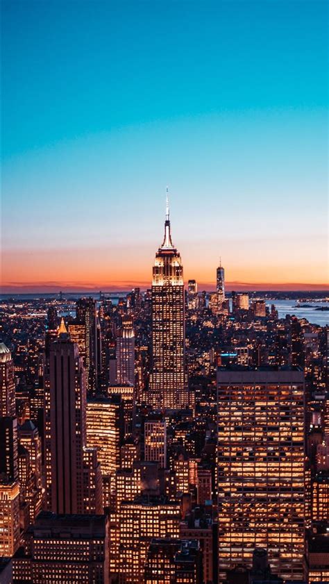 Aerial View Of City Buildings During Night Time Iphone Wallpapers Free