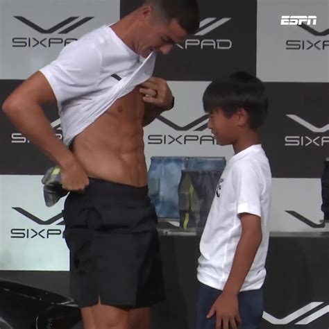 Al Nassr star Cristiano Ronaldo shows abs to fan who looks on in ...