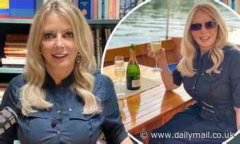 Carol Vorderman Struggles To Contain Her Ample Assets In Navy Dress At