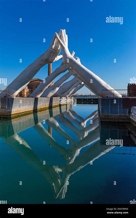 Building Bridges Sculpture By Artist Lorenzo Quinn Depicting 6 Pairs Of