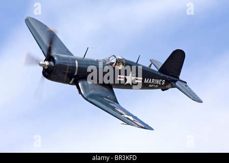 A Vought F4U Corsair fighter and Japanese Zero recreate an aerial ...