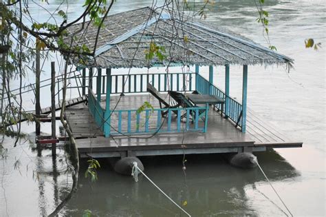 premium photo built structure floating  lake  trees