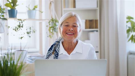 Happy Senior Woman With Laptop Indoors At Stock Footage Sbv 338476555