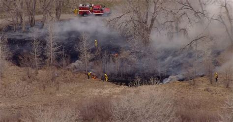 Fire Crews Battle Brush Fire Burning Along Cherry Creek Trail Near