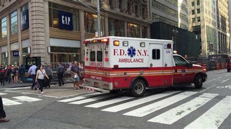 FDNY AMBULANCE RESPONDING ON WEST 42ND STREET IN TIMES SQUARE AREA OF