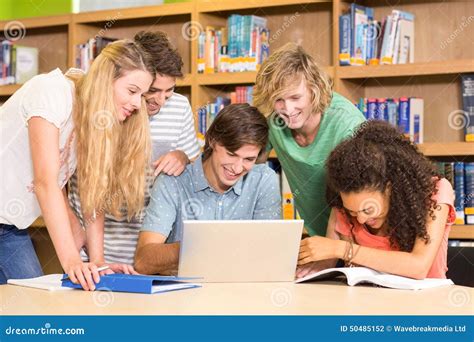 College Students Using Laptop in Library Stock Photo - Image of front ...