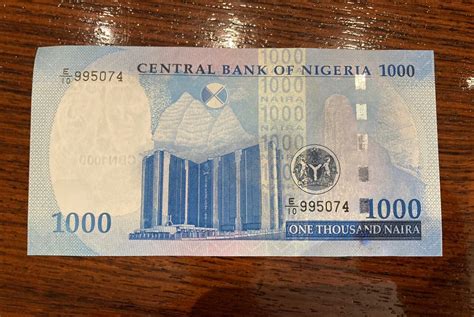 Photos Buhari Unveils Nigerias New Naira Notes