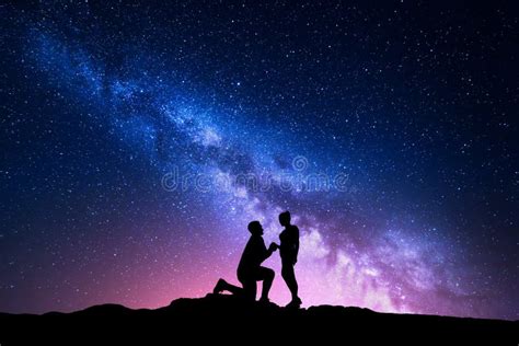 Milky Way. Night Landscape with Silhouettes of a Couple Stock Photo ...