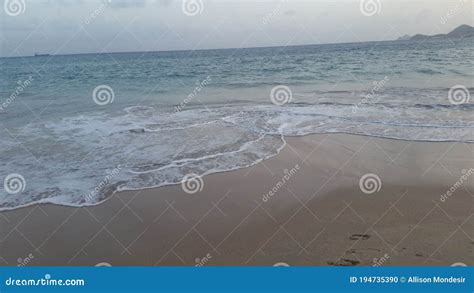 Waves breaking on shore stock photo. Image of ocean - 194735390