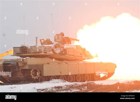 A Round Is Fired From An M1A2 Main Battle Tank Belonging To 1st