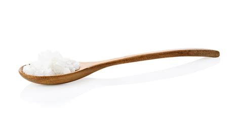 Premium Photo Sea Salt On Wooden Spoon Isolated