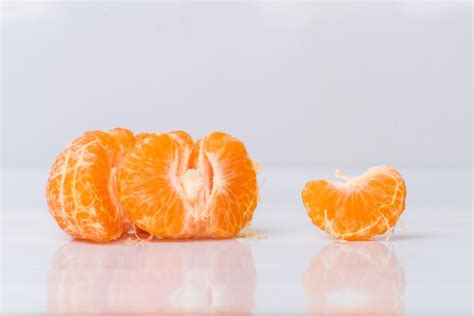 Premium Photo Mandarin Orange Segments Sweet Fruit In Segments Color