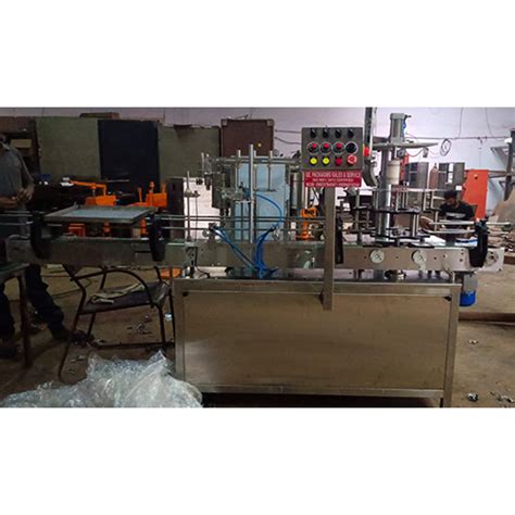 Semi Automatic Automatic 4 Head Bottle Filling And Capping Machine At