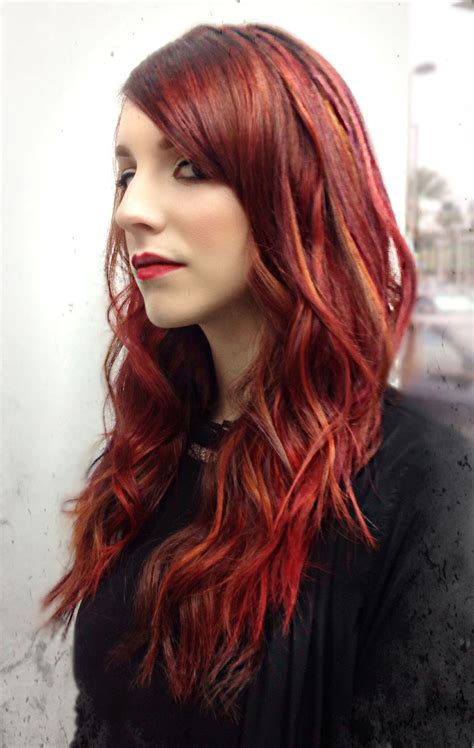 Vibrant Red Hair With Wavy Styling Using Schwarzkopf Color