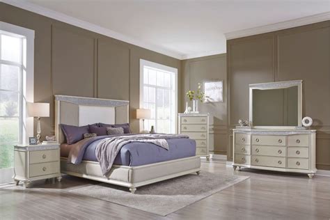 A Bedroom Scene With Focus On The Bed And Dresser