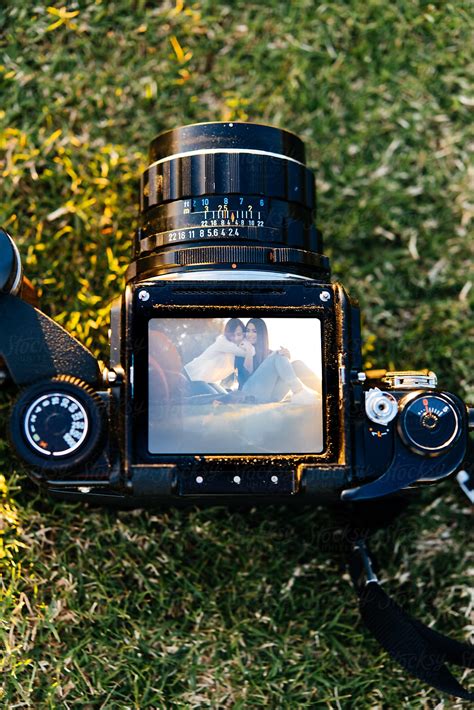 Two Woman Relaxing In A Park Captured By An Old Camera By Stocksy Contributor Sky Blue