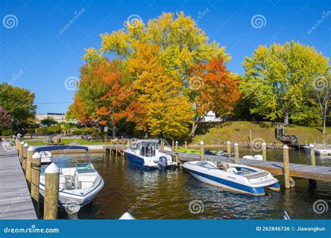 View The Winnipesaukee Pier And Boats Docked On Lake Winnipesaukee In