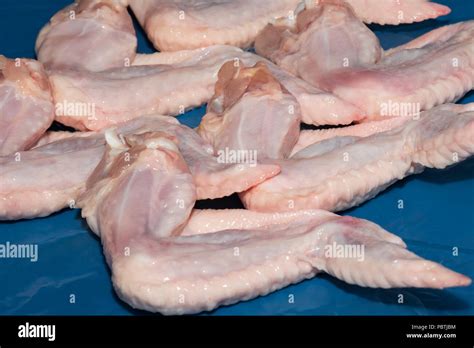 An Uncooked Chicken Wing High Resolution Stock Photography And Images