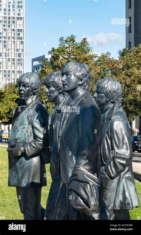 The Andy Edwards Beatles Statue At Pier Head In Liverpool Stock Photo