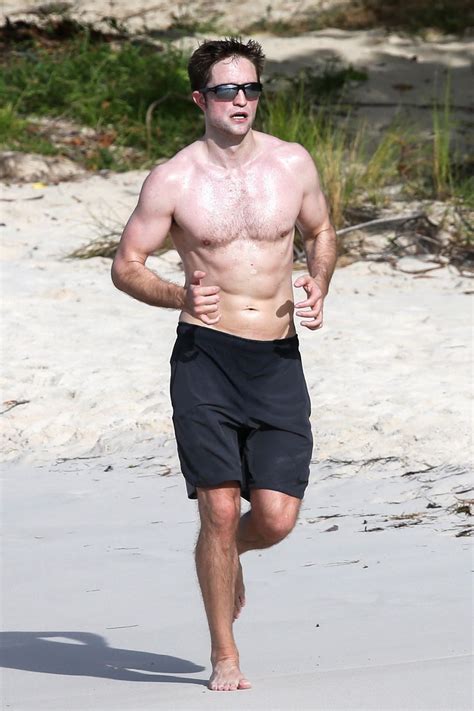 Robert Pattinson Working Out Shirtless On The Beach—pics