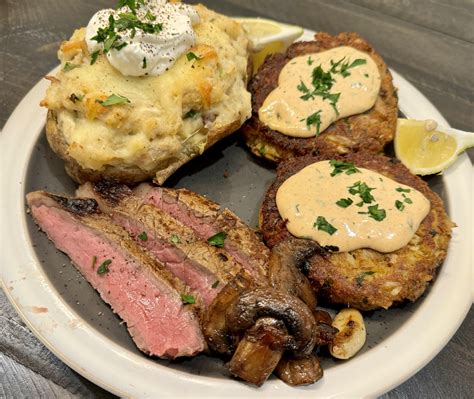 Crab Cakes Steak And A Twice Baked Potato Dining And Cooking