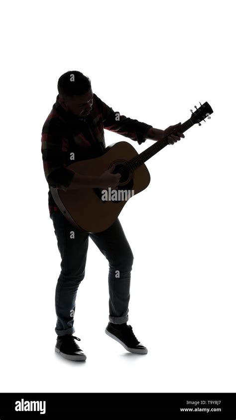 Silhouette of man with guitar on white background Stock Photo - Alamy