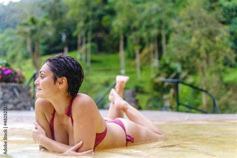 Horizontal View Of Latin American Woman Wearing Bathing Suit At Thermal