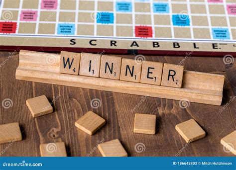 Scrabble Board Game With The Scrabble Tile Spelling `winner` Editorial