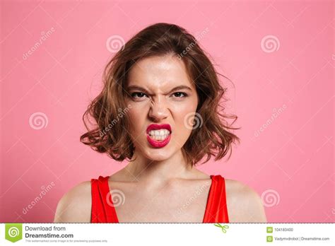 Close Up Portrait Of Angry Young Woman With Red Lips Looking At Stock