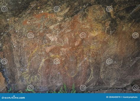 Aboriginal Rock Art Of People Dancing At Kakadu National Park Northern