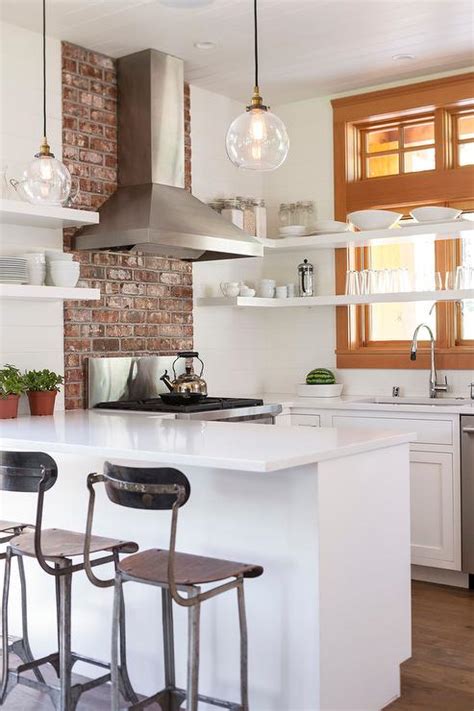 Black Industrial Stools At White Kitchen Peninsula Transitional Kitchen