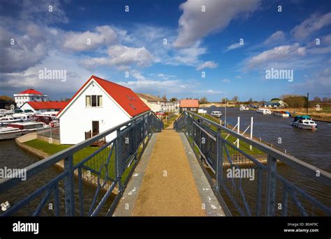 A View Of Potter Heigham Showing The River Thurne To The Right And