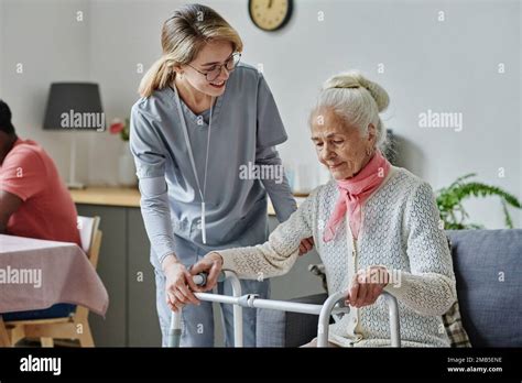 Caregiver Helping Old Woman Walker Hi Res Stock Photography And Images