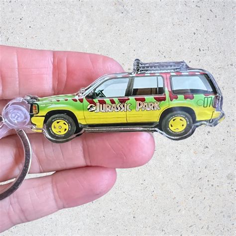 The Jurassic Park Jeep Keychain And Free Matching Sticker Jurassic Park Ts Jurassic Park