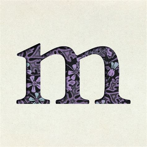 The Letter M Is Made Up Of Purple And Blue Flowers