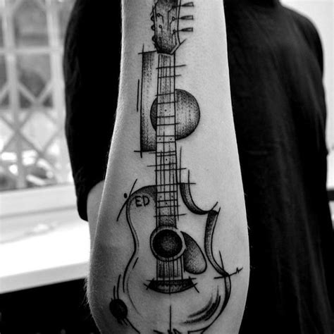 ”30 Inspiring Guitar Tattoo Designs For Music Enthusiasts” News0days