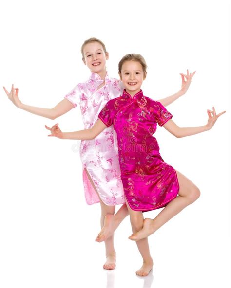 Girls are Sisters in Chinese National Dresses. Stock Photo - Image of ...