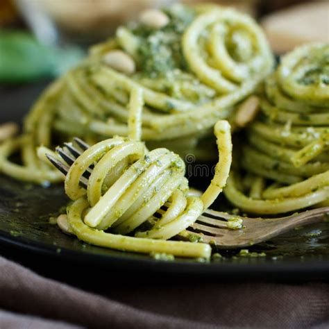 Spaghetti Pasta With Pesto Sauce Basil Pine Nuts And Parmesan Close