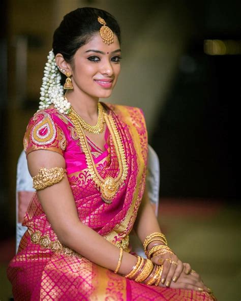 South Indian Bride Gold Indian Bridal Jewelry Temple Jewelry Jhumkis Pink Silk Kanchipuram