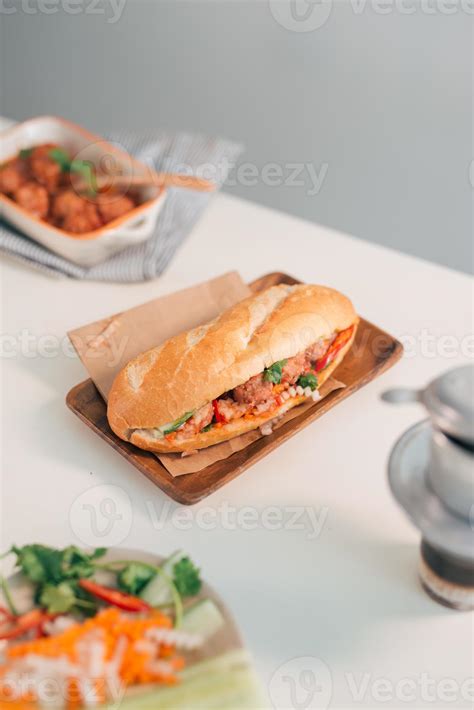 Banh Mi Xiu Mai Is A Popular Pork Ball Sandwich With Tomato Sauce In