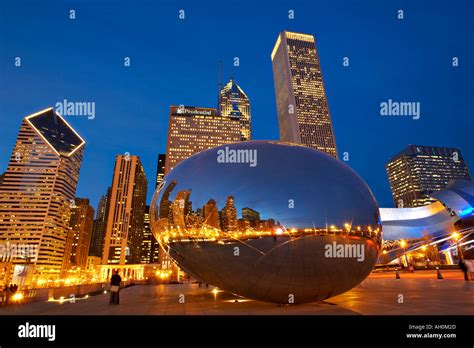 NIGHT Chicago Illinois The Bean sculpture reflect skyline Millennium ...