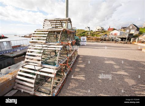 Lobster Traps Drying Out On Dock In Peggys Cove Nova Scotia Stock Photo