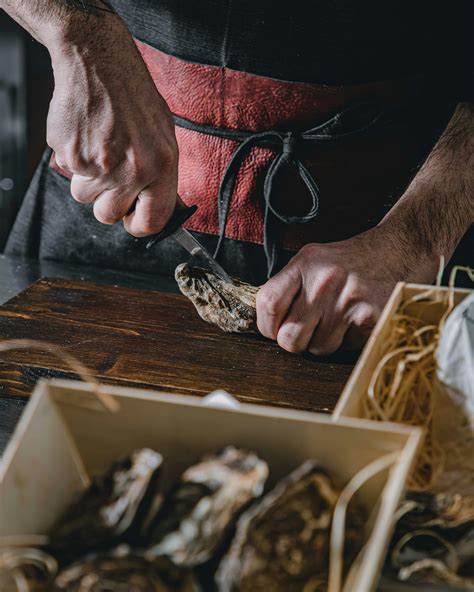 A Chef Sharpening a Knife Using a Honing Steel · Free Stock Photo