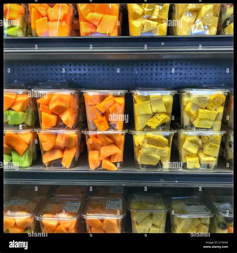 Fruit salad portions on supermarket shelf Stock Photo - Alamy