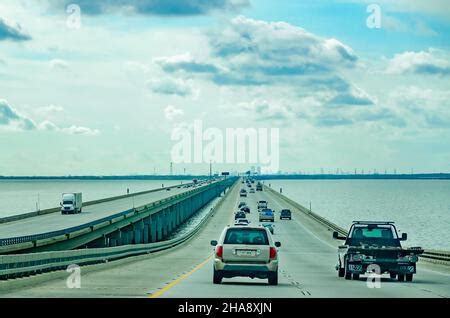 Vehicles travel across the I-10 Twin Span Bridge across Lake ...