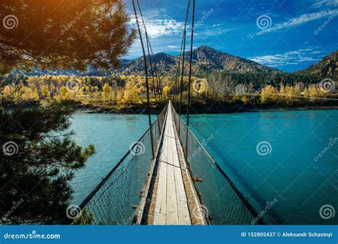 Pedestrian Suspended Wooden Bridge Over Mountain River Long Bridge